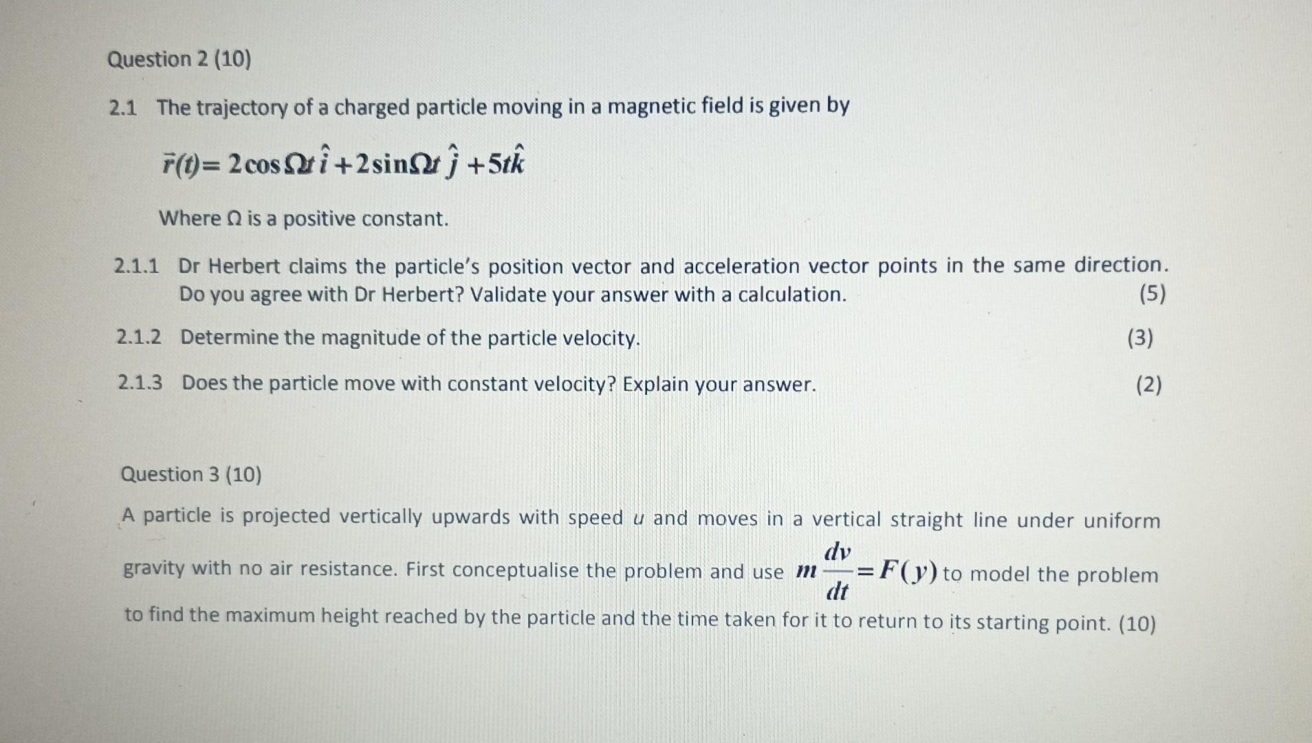 Solved 2.1 The trajectory of a charged particle moving in a | Chegg.com