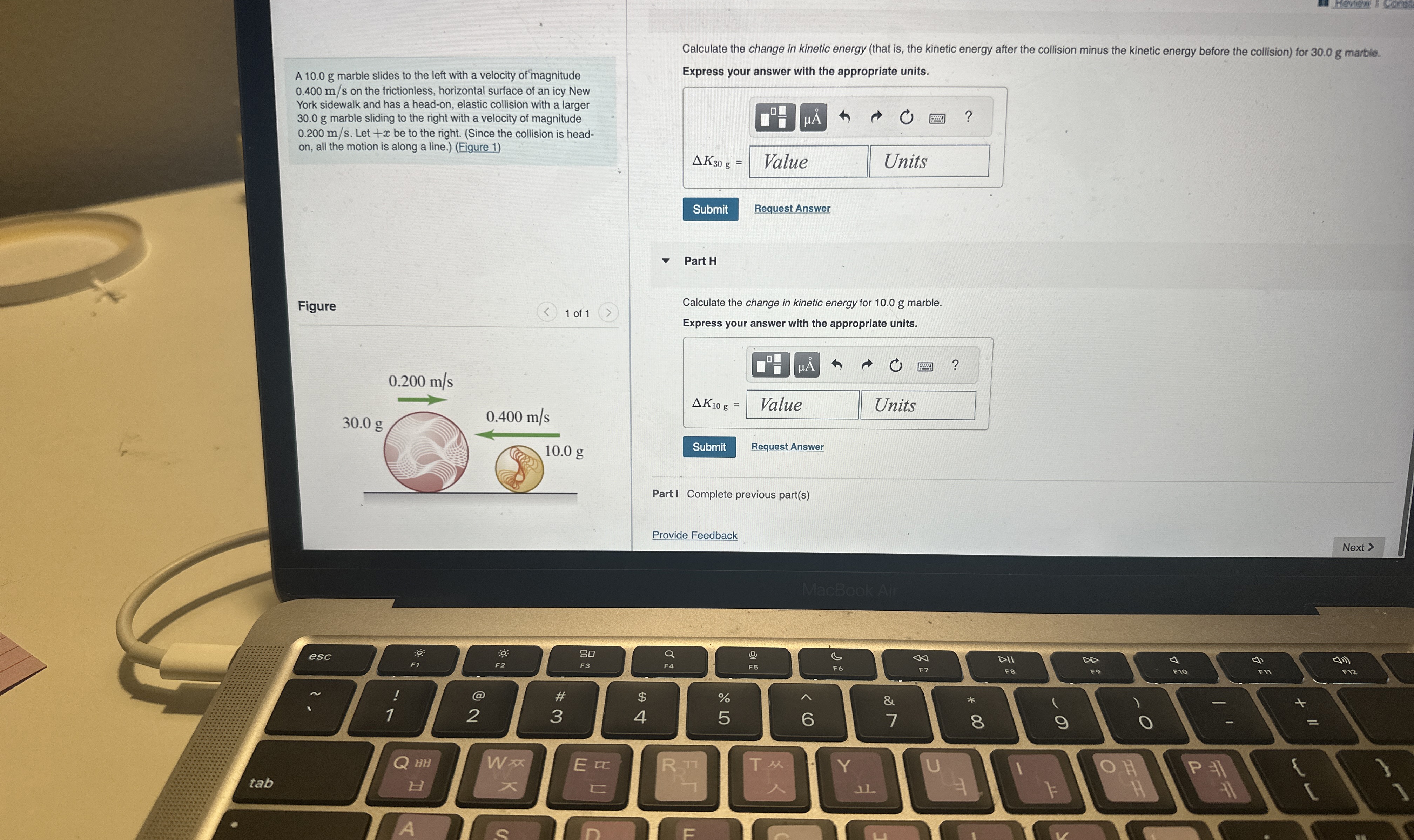 Solved A 10.0 ﻿g marble slides to the left with a velocity