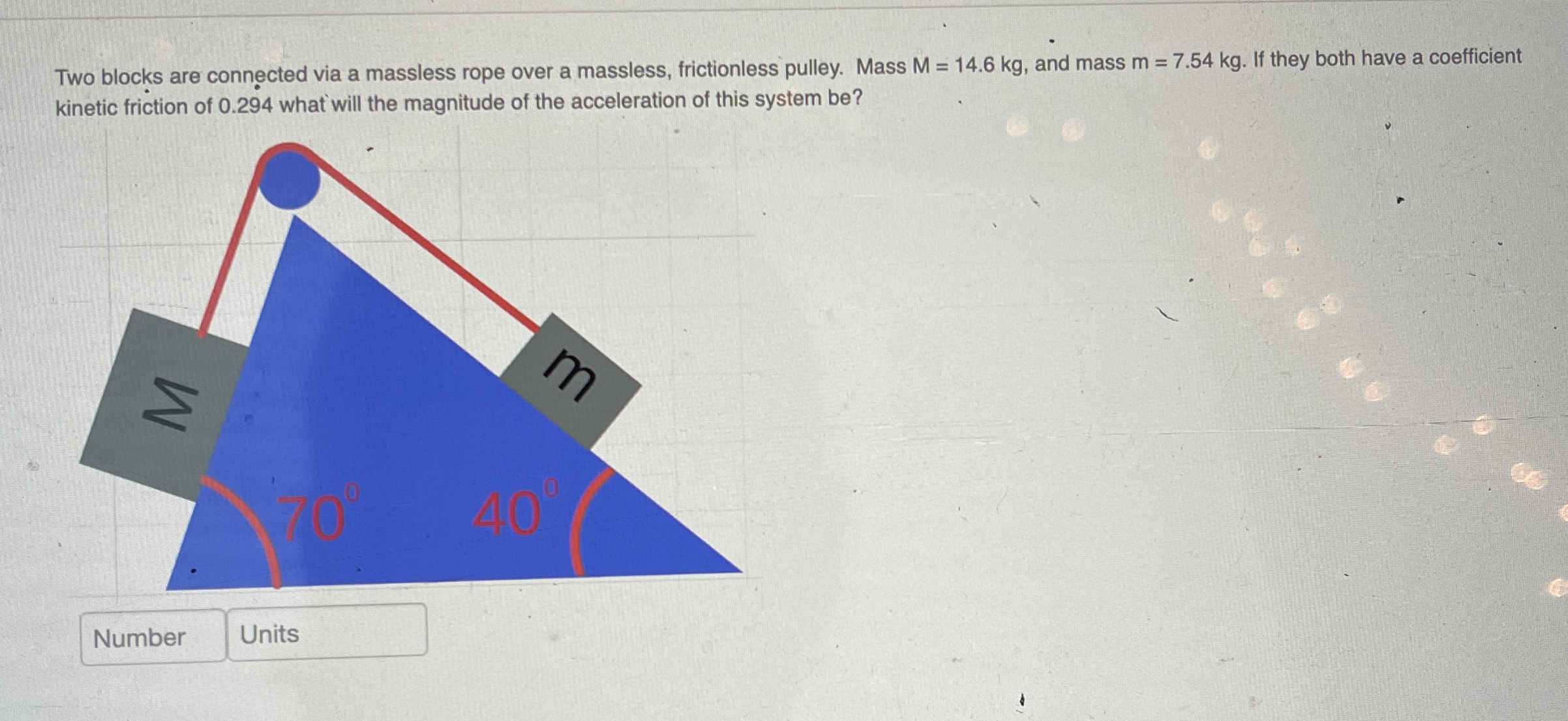 Solved Two blocks are connected via a massless rope over a | Chegg.com