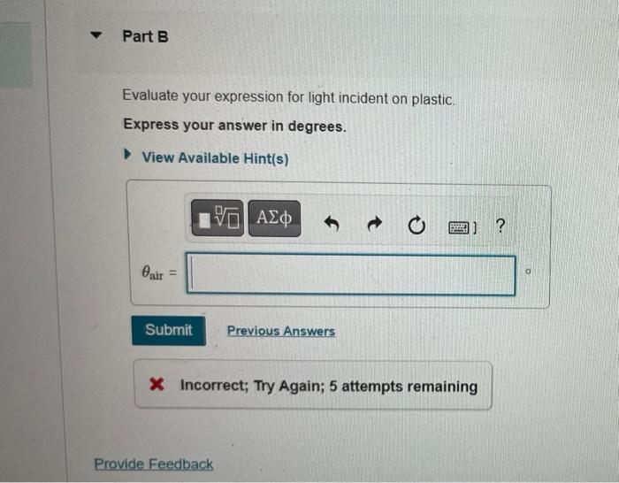 Solved A light ray in air is incident on a transparent | Chegg.com