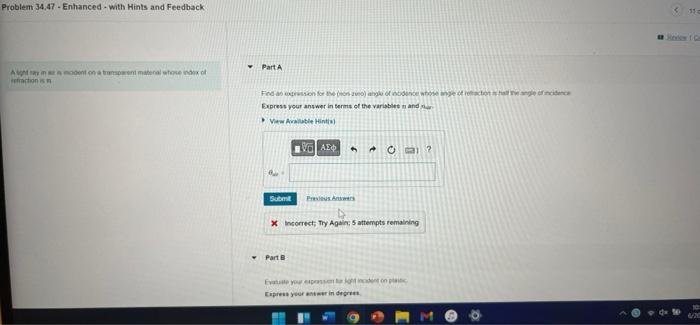 Solved A light ray in air is incident on a transparent | Chegg.com