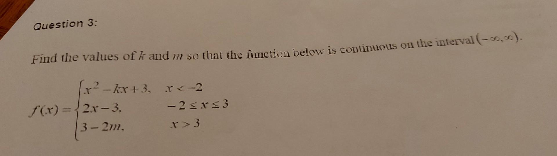 Solved Find the values of k and m so that the function below
