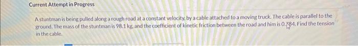 Solved A stuntman is being pulled along a rough road at a | Chegg.com