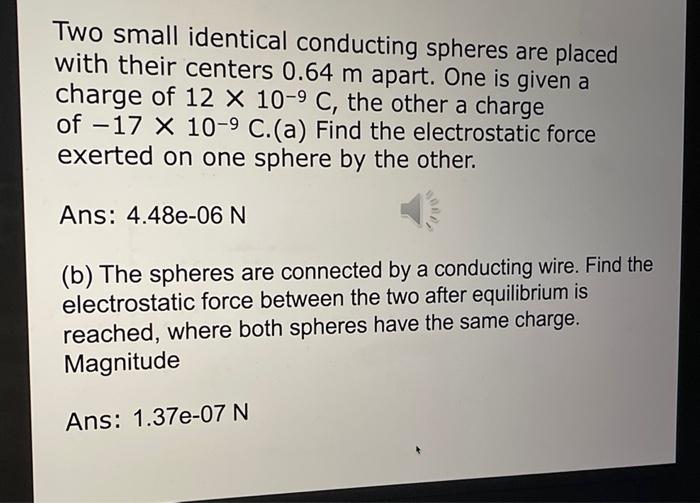 Solved Two Small Identical Conducting Spheres Are Placed | Chegg.com