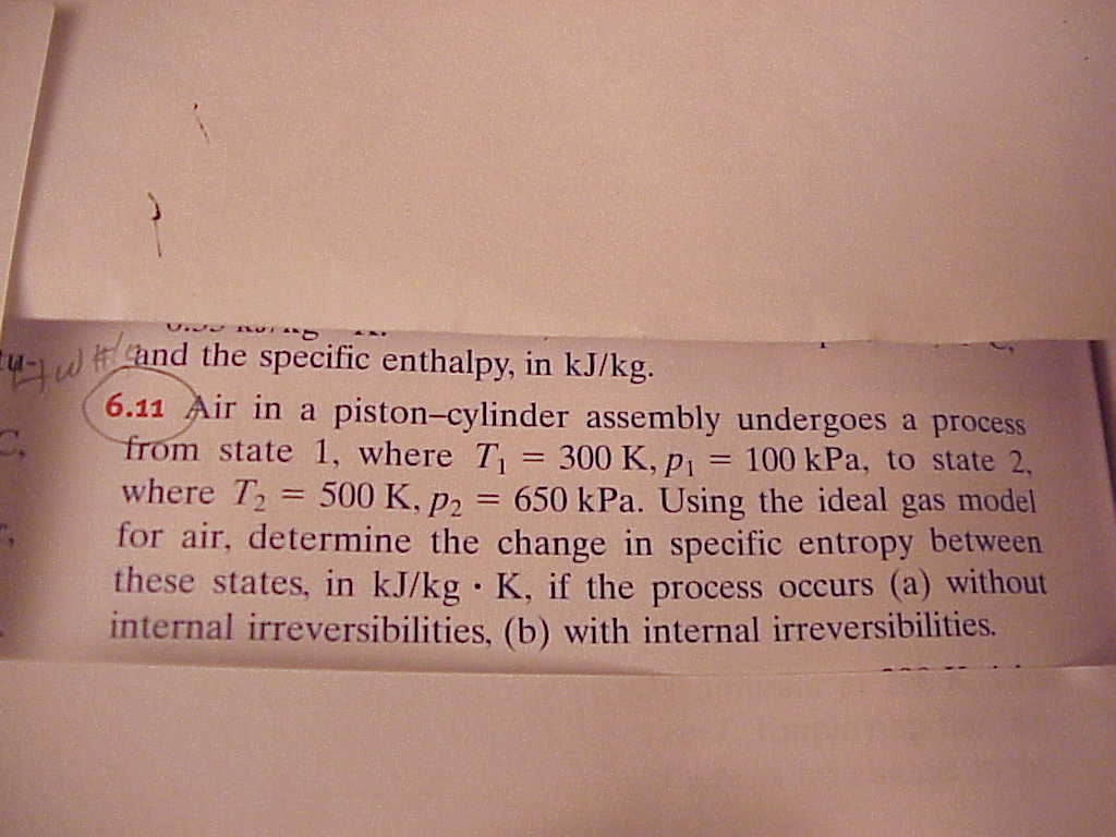 Air in a pistoncylinder assembly undergoes a process