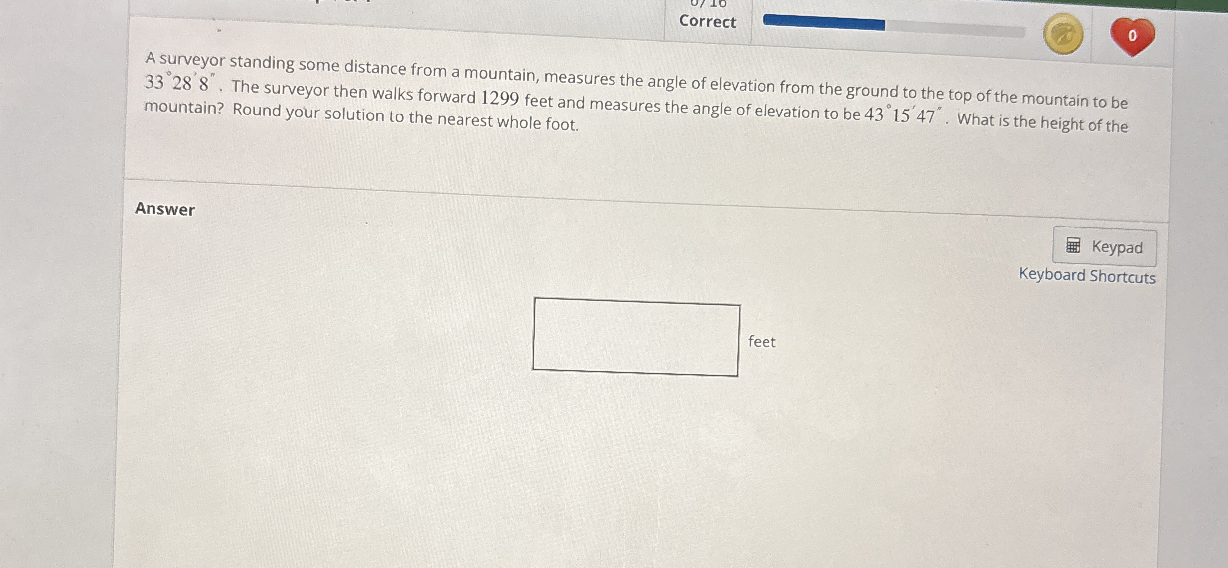 A surveyor standing some distance from a mountain,