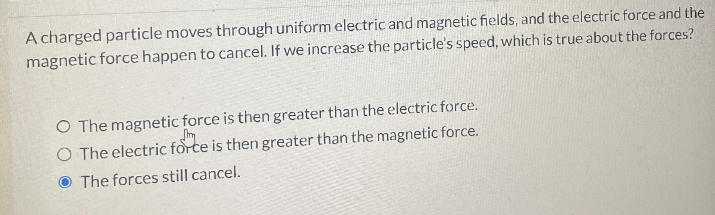Solved A charged particle moves through uniform electric and | Chegg.com