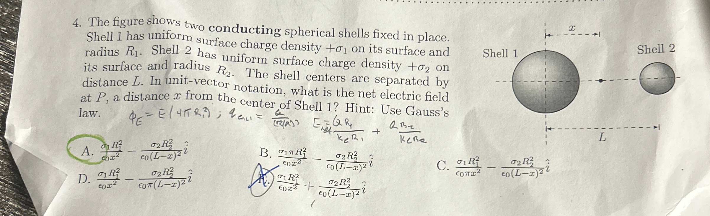 Solved The figure shows two conducting spherical shells | Chegg.com
