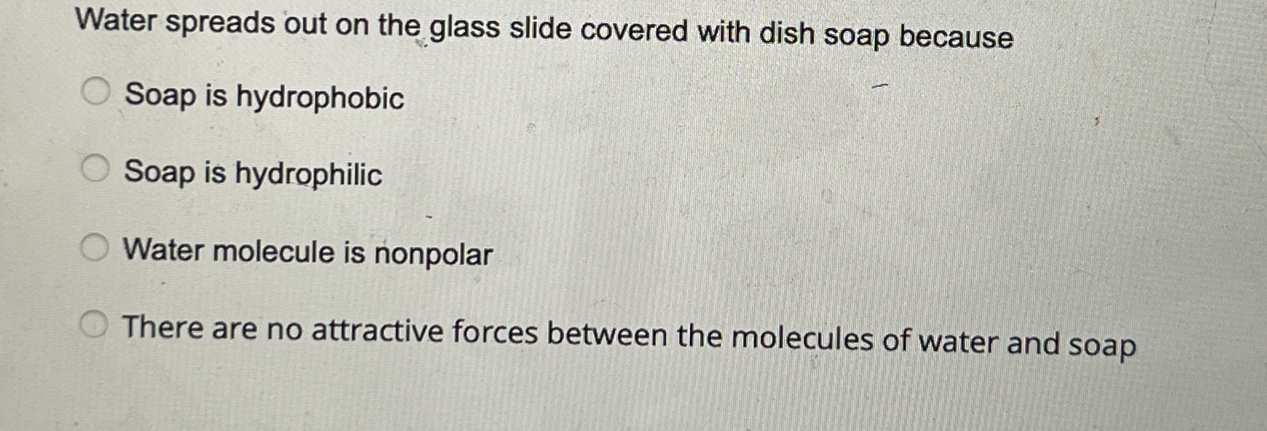 Solved Water spreads out on the glass slide covered with