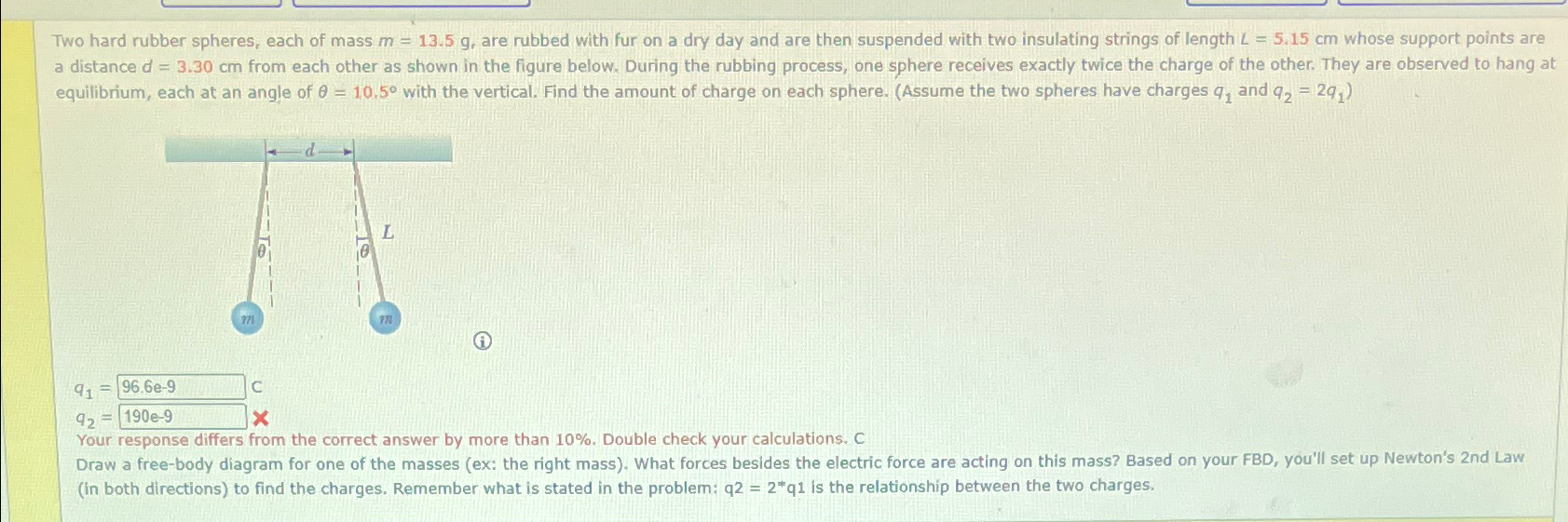 Two hard rubber spheres, each of mass m=13.5g, ﻿are