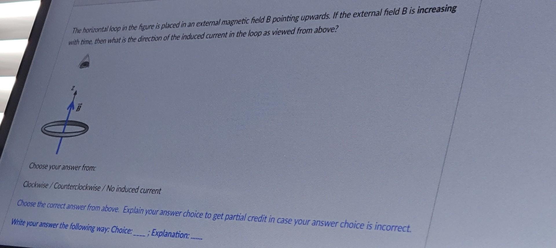 Solved The horizontalloop in the figure is placed in an | Chegg.com