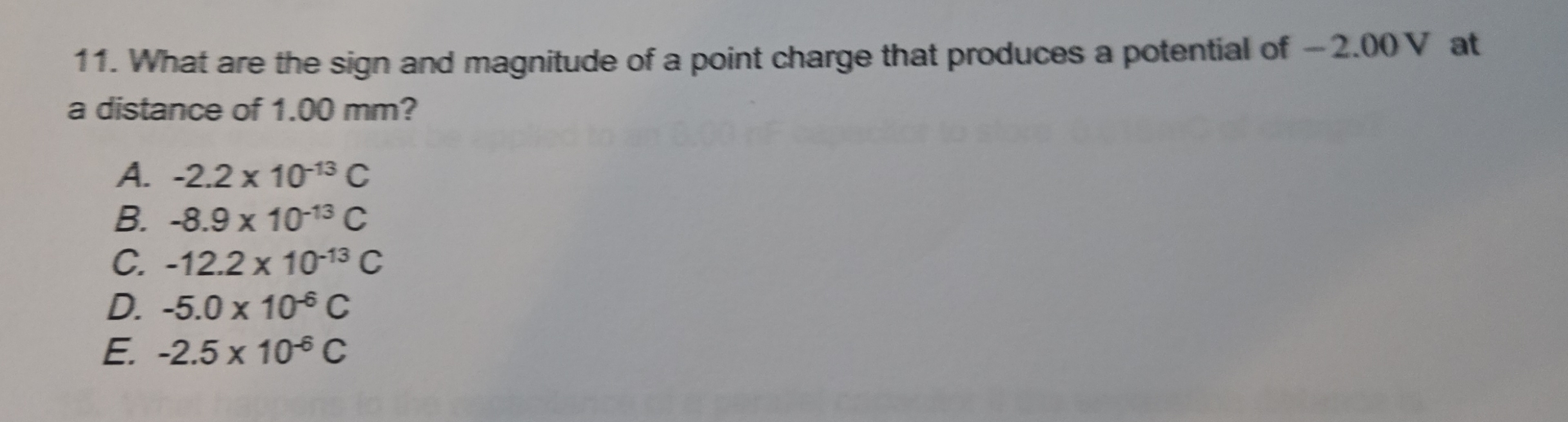 Solved What are the sign and magnitude of a point charge | Chegg.com