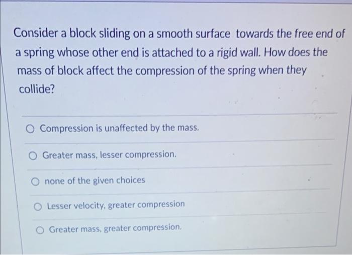 Solved Consider a block sliding on a smooth surface towards | Chegg.com