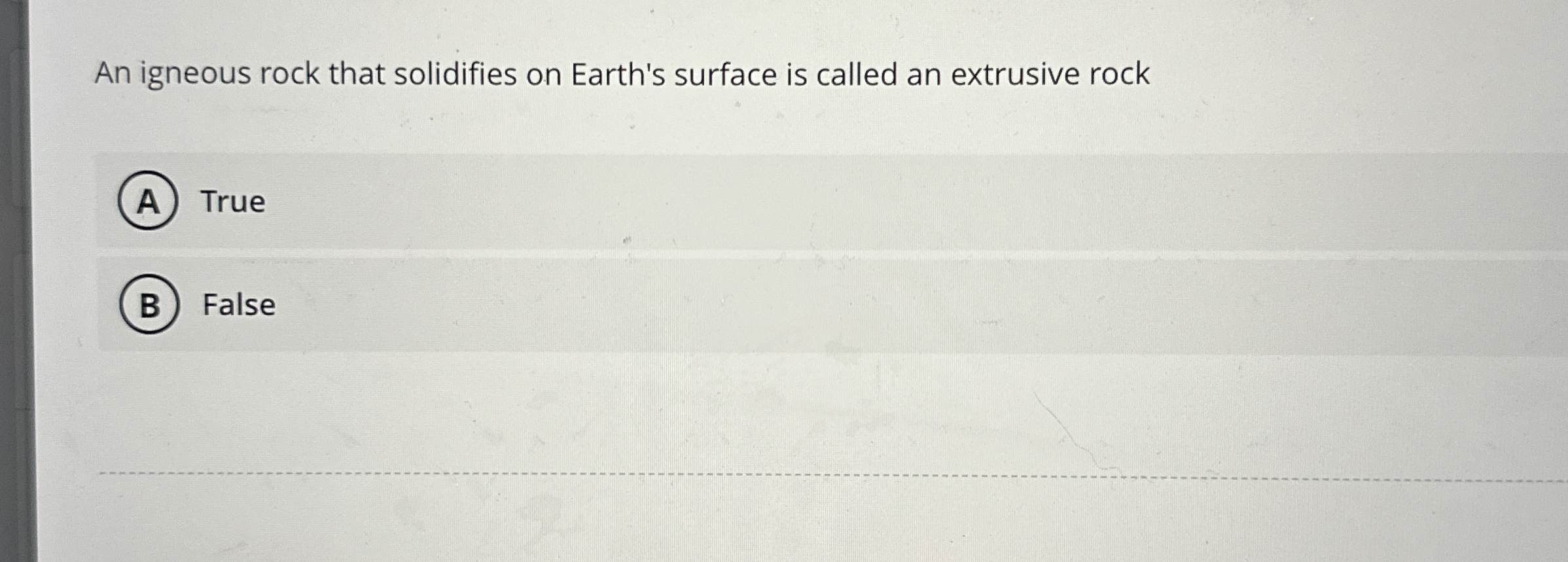 Solved An igneous rock that solidifies on Earth's surface is | Chegg.com
