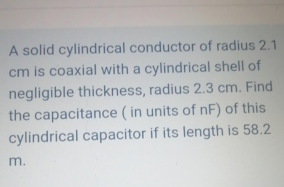 Solved A solid cylindrical conductor of radius 2.1 cm is | Chegg.com