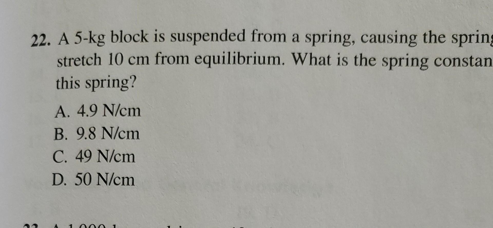 Solved 22. A 5-kg Block Is Suspended From A Spring, Causing | Chegg.com