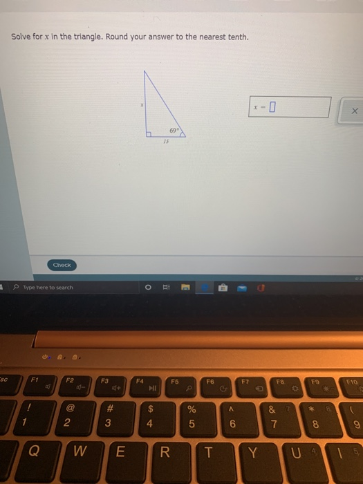 Solved solve for x in the triangle. round your answer to the | Chegg.com