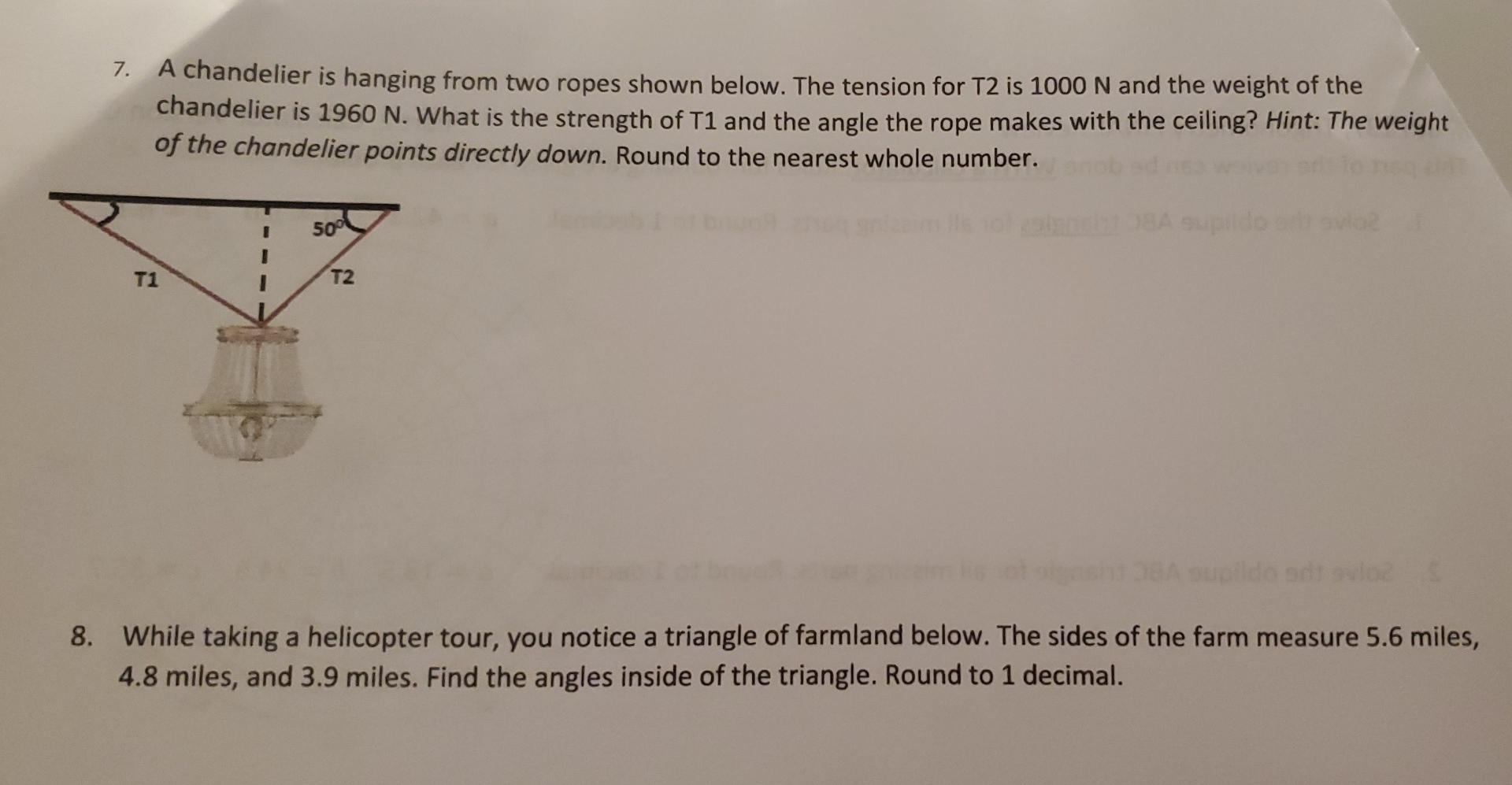 Solved 7. A chandelier is hanging from two ropes shown | Chegg.com